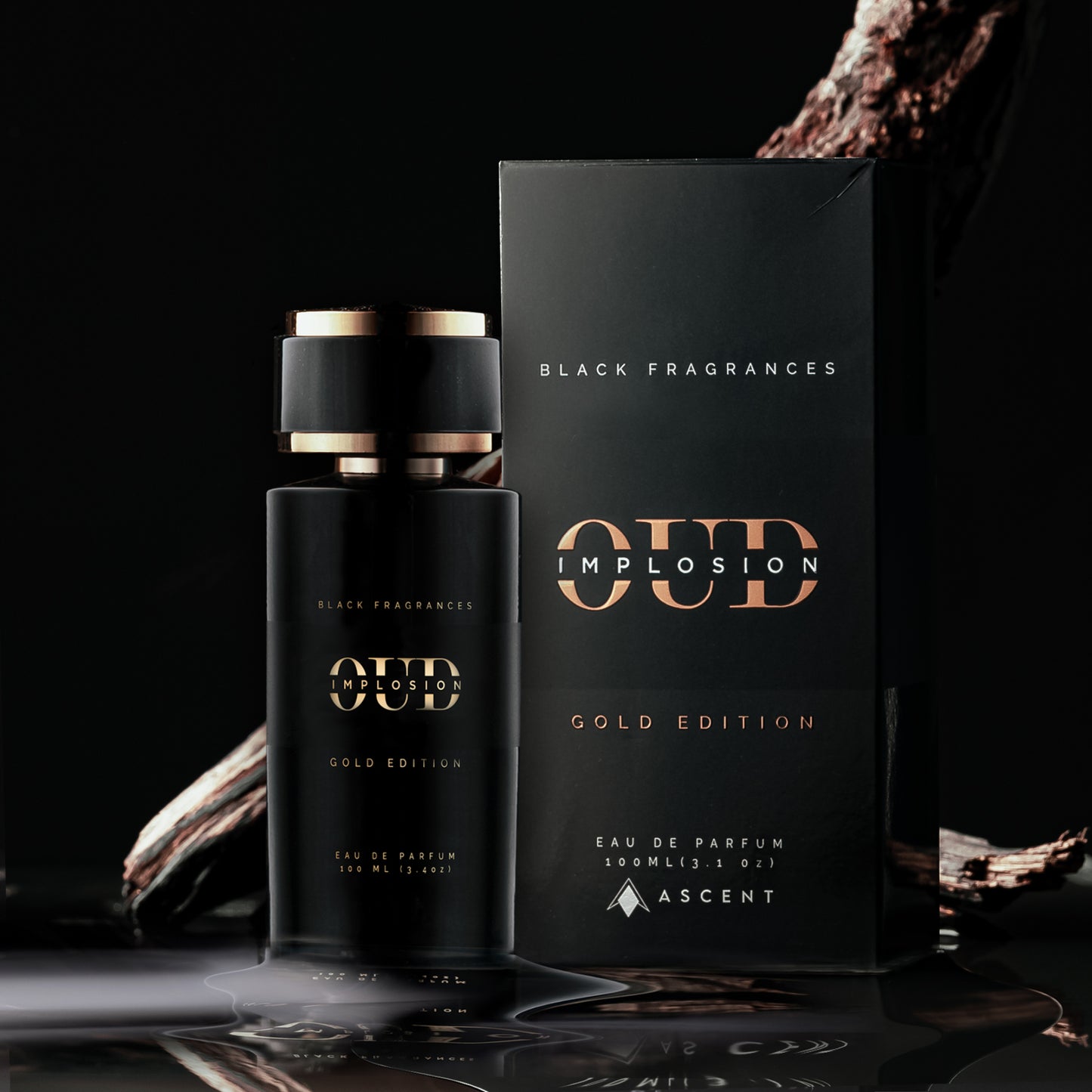 Oud Implosion Gold Edition Eau de Parfum by Black Fragrances, 100ml, luxurious men's perfume with a sophisticated oud fragrance, displayed on a wooden surface with a dark background.