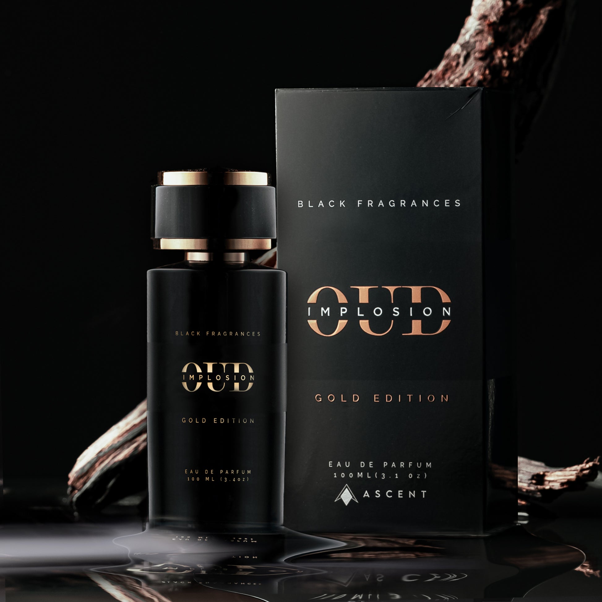 Oud Implosion Gold Edition Eau de Parfum by Black Fragrances, 100ml, luxurious men's perfume with a sophisticated oud fragrance, displayed on a wooden surface with a dark background.