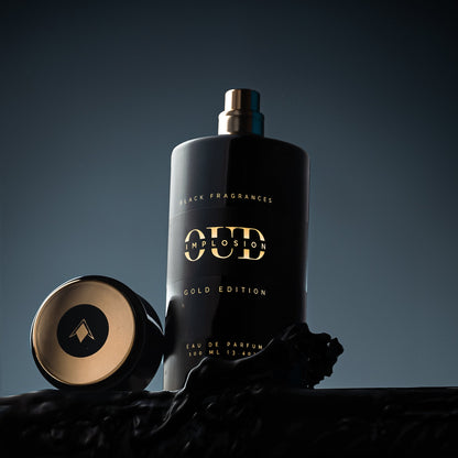 Black bottle with gold accents, Oud Implosion Gold Edition Eau de Parfum 100ml.